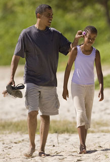Obama with daughter Malia on Kailua Beach - Hawaii vacation