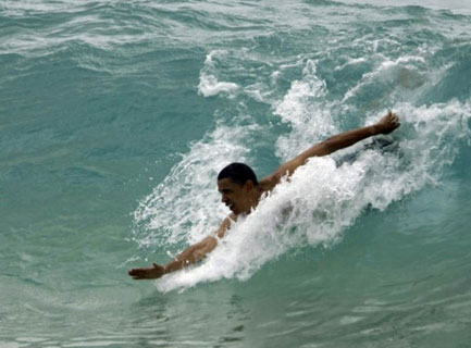 Obama body surfing at Sandy Beach - Hawaii vacation