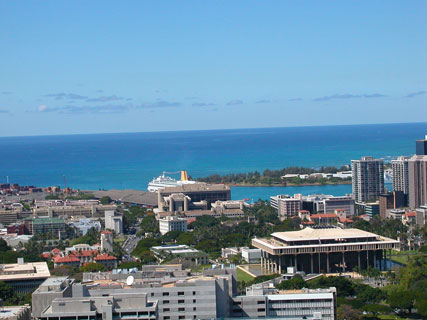 Hawaii state capitol and cruise ship in downtown Honolulu