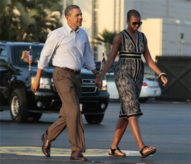 President Obama and Michelle depart Hawaii